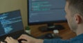 Man coding html and programming on screen Monitors, development web, developer. Royalty Free Stock Photo