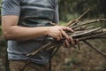 Man collecting dry twigs for bonfire Royalty Free Stock Photo