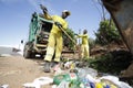 Man collecting garbage in camacari