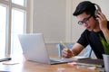 Man college student  studying learning lesson with computer online taking note Royalty Free Stock Photo