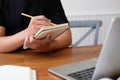 Man college student  studying learning lesson with computer online & taking note Royalty Free Stock Photo