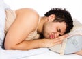 Man comfortably sleeping in his bed Royalty Free Stock Photo