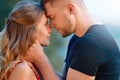 Man comforting his girlfriend embracing her in a park Royalty Free Stock Photo