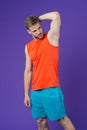 Man confident in his antiperspirant. Guy checks dry armpit satisfied with healthy skin. Prevent, reduce perspiration. No