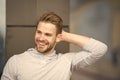 Man confident in his antiperspirant. Prevent, reduce perspiration. No sweat - deodorant works. Guy checks dry armpit Royalty Free Stock Photo