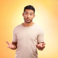 Man, confused and hands out isolated with questions and asking why on yellow background with mockup. Confusion, doubt Royalty Free Stock Photo