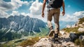 Man conquers mountain peaks Royalty Free Stock Photo