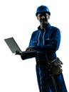 Man construction worker computing computer silhouette portrait Royalty Free Stock Photo