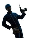 Man construction worker holding drill silhouette Royalty Free Stock Photo