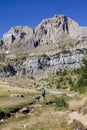 Man contemplating the peak in the mountains