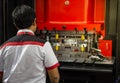 Man control hydraulic press machine Royalty Free Stock Photo