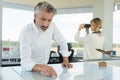 man in control tower looking at map Royalty Free Stock Photo