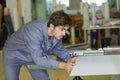 man controlling hydraulic press machine for cutting steel Royalty Free Stock Photo