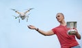 Man controls a quadrocopter in park