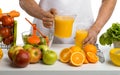Man cook, cooking freshly squeezed juice, on whie background,
