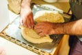 man cook Traditional Georgian dish khachapuri ajarian. National Georgian pastries with cheese and raw eggs