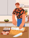 Man cooking Asian sushi. Home made Japanese dish, cuisine. Character cooks Japan food at house kitchen, sprinkling rice