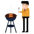 Man is cooking a barbecue grill. Fry meat and sausages on fire Royalty Free Stock Photo