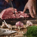 Man cooking beef steaks on the home kitchen Royalty Free Stock Photo