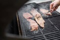 Man Cooking Fresh Steaks on the Grill Royalty Free Stock Photo