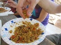 Man cooking at his kitchen eastern cuisine, Uzbek cuisine