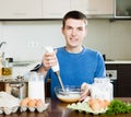 Man cooking in kitchen Royalty Free Stock Photo