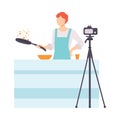 Man Cooking at Kitchen and Recording Video on Camera, Male Food Blogger Creating Content about His Hobby and Posting It