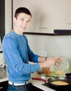 Man cooking omelet Royalty Free Stock Photo