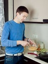 Man cooking scrambled eggs Royalty Free Stock Photo