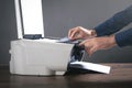 Man copying and scanning documents in office Royalty Free Stock Photo
