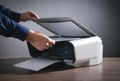 Man copying and scanning documents in office Royalty Free Stock Photo