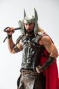 Man in cosplaying Thor isolated on white studio background Royalty Free Stock Photo