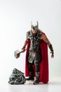 Man in cosplaying Thor isolated on white studio background