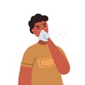 Man coughing into tissue