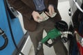 Man Counting Money At Fuel Station Royalty Free Stock Photo