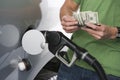 Man Counting Money While Refueling Car Royalty Free Stock Photo
