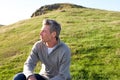 Man in countryside relaxing