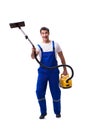 The man in coveralls doing vacuum cleaning on white Royalty Free Stock Photo