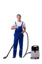 The man in coveralls doing vacuum cleaning on white Royalty Free Stock Photo