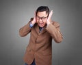 Man Covered his Ear Ignoring Noise Royalty Free Stock Photo