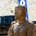 Man covered in mud during The Dirty Dash