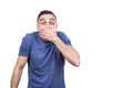 Man covering his mouth with expression of surprise
