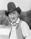 Man in a cowboy hat looking angry Royalty Free Stock Photo