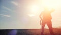 A man cowboy hat and a loso in the field. American farmer in a f Royalty Free Stock Photo