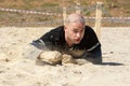 Man crawling on sand Royalty Free Stock Photo