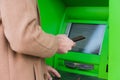 entering pin code in atm Royalty Free Stock Photo