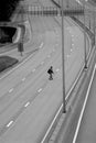 Man crossing the motorway Royalty Free Stock Photo