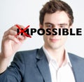 Man crossing out impossible concept Royalty Free Stock Photo