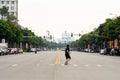 Man crossing the road in HCMC, Vietnam