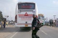 A man crossing road risking his life